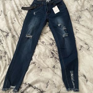 🆕 Denim jeans with holes. Size 11/12 stretchy jeans fits a size smaller